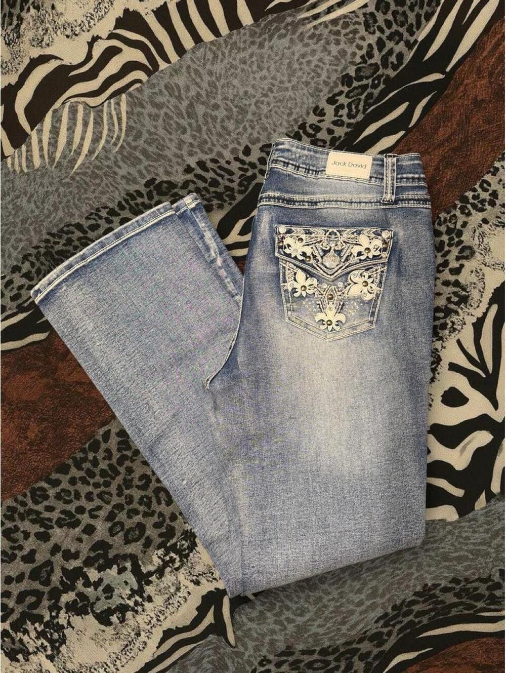 Jack David blue jeans with white floral embroidery on back pocket
